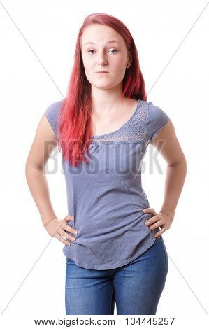 casual young woman is miffed. isolated on white.