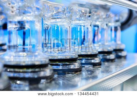 Abstract Background With Blue Glass Tubes.