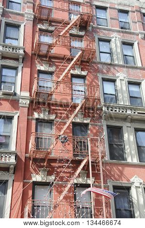 A building in New Your city showing a fire escape.