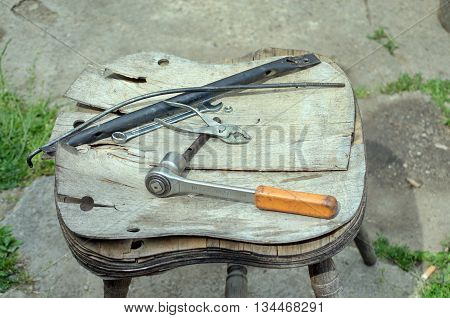 Repair tools and objects on the chair