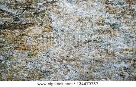 The texture of the stone. Grey granite.