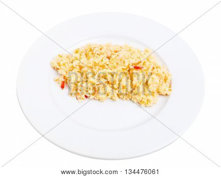 Delicious couscous porridge with tomatoes and onions. Isolated on a white background.
