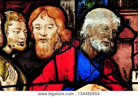 Triel sur Seine France - april 3 2016 : historical stained glass window in Saint Martin church