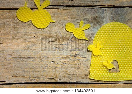 Beeswax, Bees And A Beehive On Wooden Table