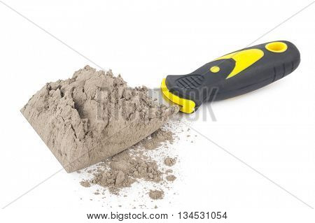 Gray cement powder with trowel