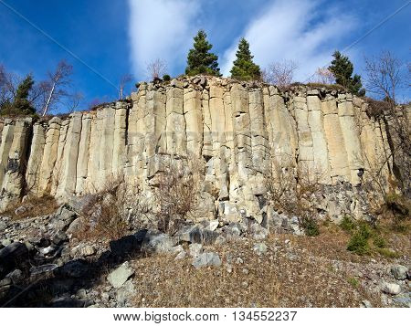 Image of the old basalt quarry in The Ore Mountains - basalt columnar jointing