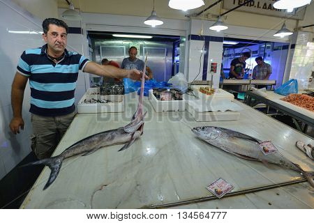 CHANIA GREECE - AUGUST 12: Unknown people sell fresh fish in Chania Crete Greece on 12 August 2014. The cross-shaped market (Agora) of Chania was built in 1911-1913.