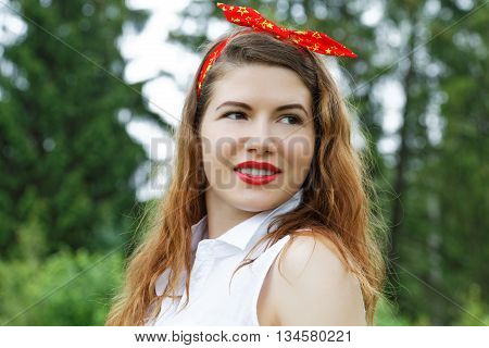 Girl resting in the foliar forest summer