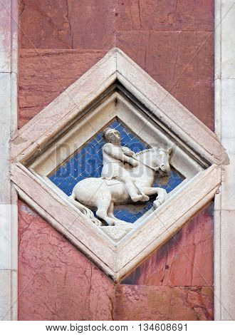 FLORENCE, ITALY - JUNE 05: Mars by Collaborator of Andrea Pisano, 1337-41., Relief on Giotto Campanile of Cattedrale di Santa Maria del Fiore, Florence, Italy on June 05, 2015