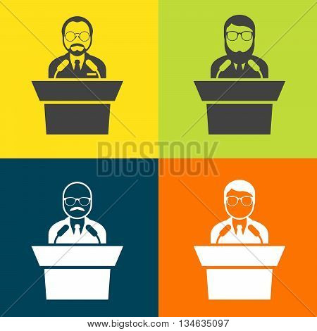 Speaker at rostrum - man in glasses at tribune