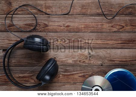 top view of music cd player equipment on wooden desk
