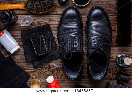 Shoe wax, brush and boot