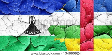 Lesotho flag with Central African Republic flag on a grunge crac