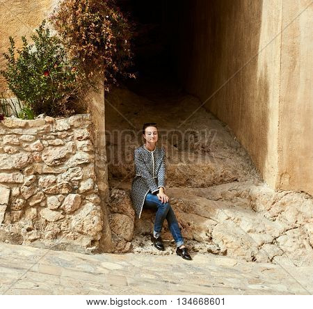 Young woman in the Miravet village. Province of Tarragona. Spain