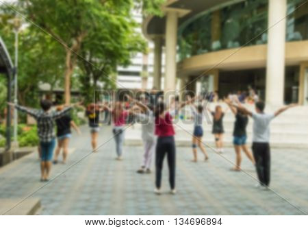 Motion blur of activity practice for cheerleader of collegian in university on holiday
