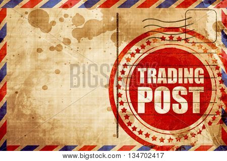 trading post, red grunge stamp on an airmail background