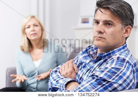 Unhappy Mature Couple Having Arguement At Home