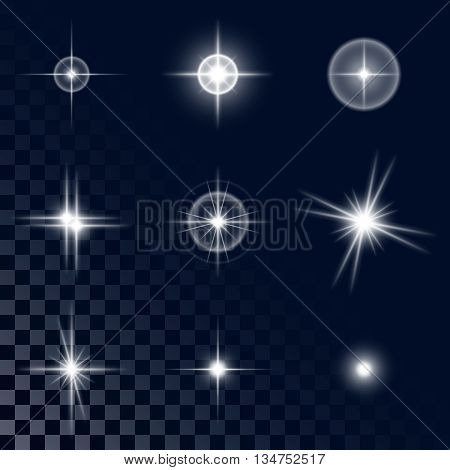 Set of the realistic beautiful white star fires and flashes on a transparent background a vector illustration
