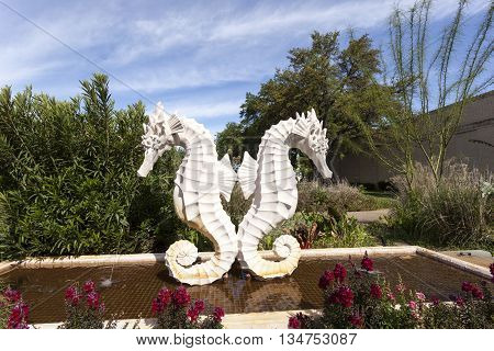 DALLAS USA - APR 8: Sea Horse Statue at the Leonhardt Lagoon of the Fair Park in Dallas. April 8 2016 in Dallas Texas United States