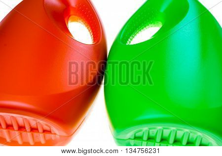 colorful abstract background made with plastic bottles of liquid detergent, it seems 2 wrestlers fightin and gnashing their teeth