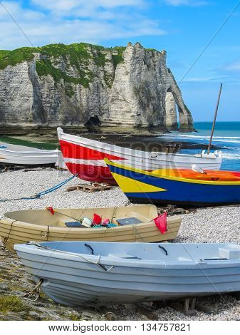 Fishing boats on the bank of English Channel. Etretat, France