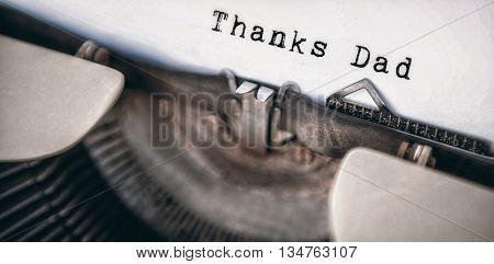 Word thanks dad against a printer