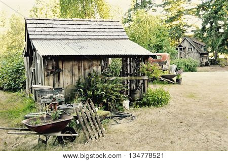 Cute little old shack in a farm yard.