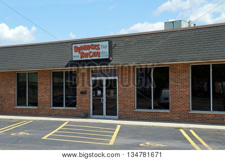 SHOREWOOD, ILLINOIS / UNITED STATES - AUGUST 21, 2015: Bedrocks Tap and The Cave Nite Club offer food, alcoholic beverages, and entertainment in a Shorewood strip mall.