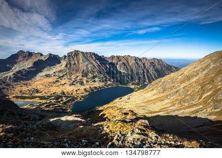Beaitiful Mountain lake in the summer Valley of five lakes Poland Zakopane