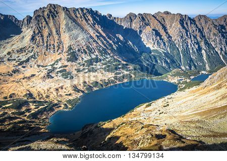 Beaitiful Mountain lake in the summer Valley of five lakes Poland Zakopane