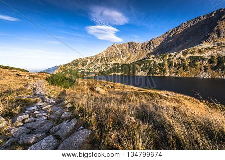 Beaitiful Mountain lake in the summer Valley of five lakes Poland Zakopane