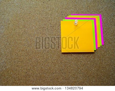 Colorful post  note on wood board with copy space
