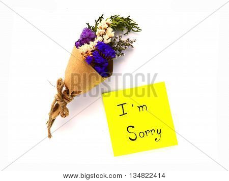 I'm sorry post note and dry bouquet on white background