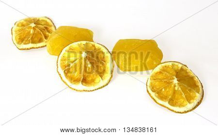 frozen fruit lemon juice frozen ice cubes isolated on white background. Feminine beauty and cosmetics concept