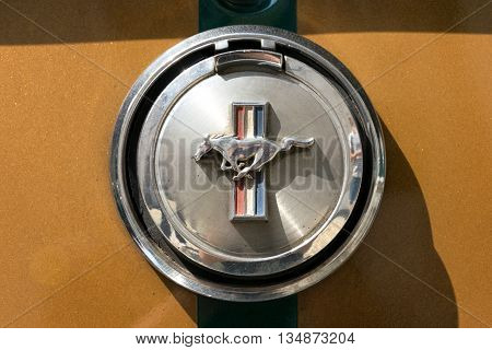 TURIN, ITALY - JUNE 9, 2016: Ford Mustang logo on the rear of a Mach 1 car model