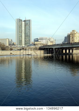 Moscow government building on Moskva-river embankment in spring. Vertical photo