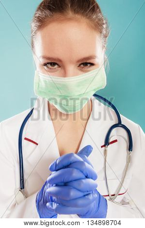 Portrait Of Female Doctor In Mask