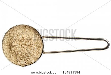red maca root powder on a metal measuring scoop isolated on white
