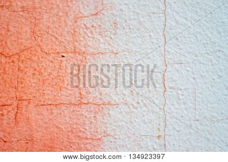 Cracked Painted Red And White Concrete Wall With Gradient Transition Of Colors