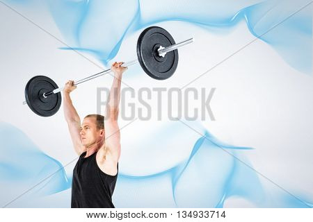 Bodybuilder lifting heavy barbell weights against grey background