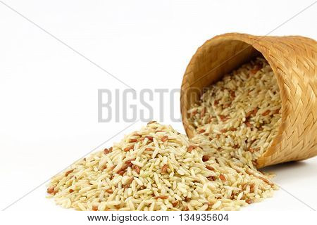 Raw Brown rice in bamboo box (Kratip) on white background