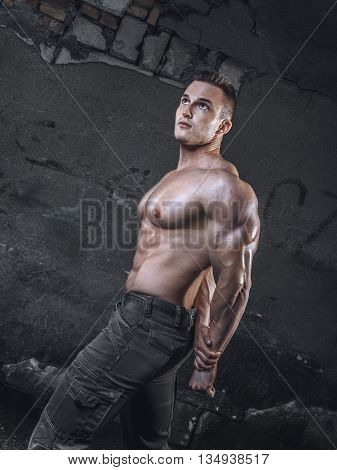 Bodybuilder On Grunge Wall