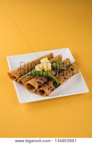 Hot delicious paratha with ghee, green chilly, coriander and tomato sauce. Paratha Rolls. Chapati made using indian spices. Kolkata rolls