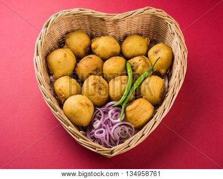 indian snacks also known as urad daal vada or indian pakoda or couth indian pakora or batata vada or aalu bonda or aalu bonde