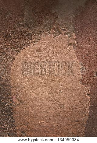 Red terra-cotta grunge roughcast background texture closeup.