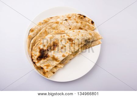 Homemade Indian Naan Flatbread made with Whole Wheat, plain indian roti, plain tandoori roti