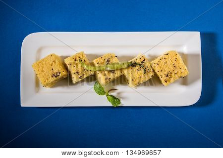 Gujrati famous snack made up of gram flour, semolina called khaman Dhokla