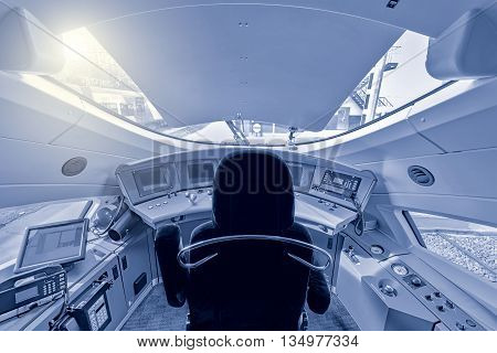 Moscow, Russia - April 08, 2015: Interior of the highspeed train cockpit. Train Sapsan (peregrine) runs between Moscow and St. Petersburg.