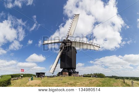 Hoejerg, Denmark - June 19, 2016: Historic Danish windmill called Pibe Moelle.