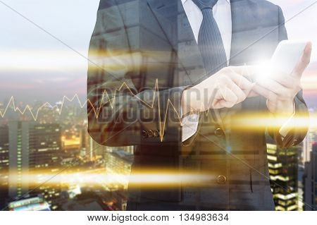 Double exposure of professional businessman using smart phone city centre of business with blurred transportation port and distribution cargo warehouse background Technology Transportation & Business trading concept